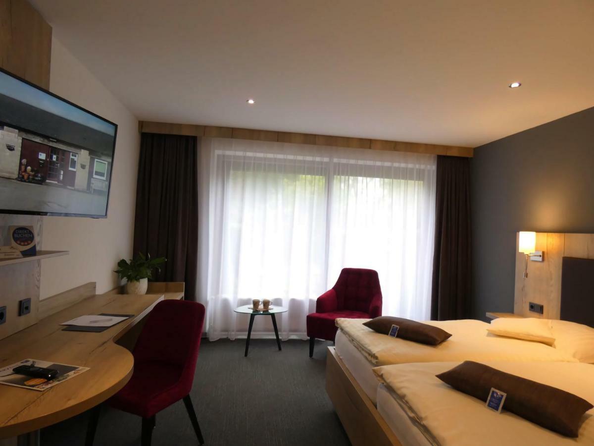 Akzent Hotel Cordes & Restaurant Am Rosengarten Sottorf Esterno foto